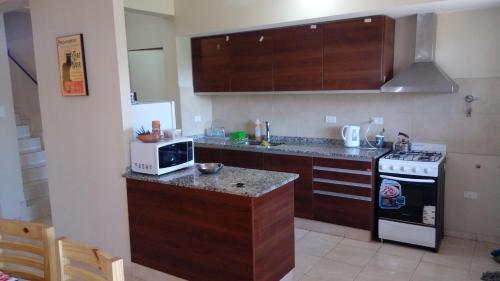 Kitchen, Duplex Kirara near Domingo Faustino Sarmiento Airport