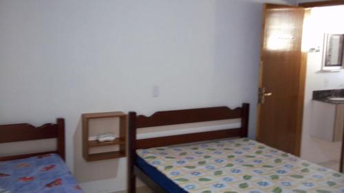 Casa do Paulo, fundos, 2 quartos, praia Mococa