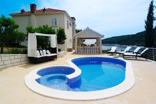 Waterfront villa with pool