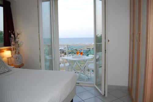 Quadruple Room with Sea View room in Hotel Rivazzurra