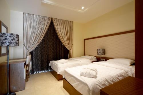 Public Security Hotel & Chalets Room Type - Double or Twin Room