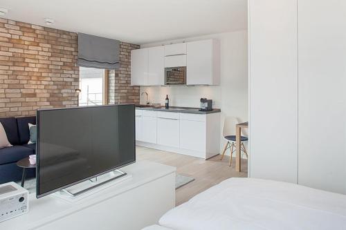 2,5 Zi Design Loft Wohnung mit Gartensitzplatz in Basel, Schweiz