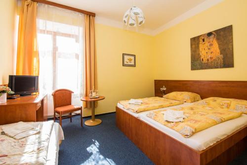 Hotel Morava - Tap to explore photos