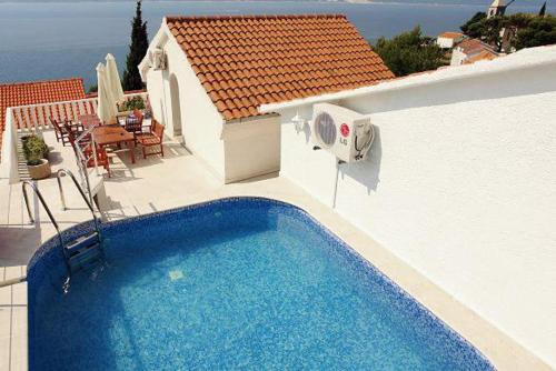 Holiday house with a swimming pool Mimice Omis - 5262