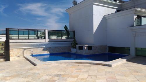 Swimming pool, Loft da Prainha in Arraial do Cabo