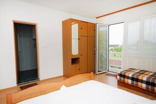 Apartments with a parking space Kampor, Rab - 5029