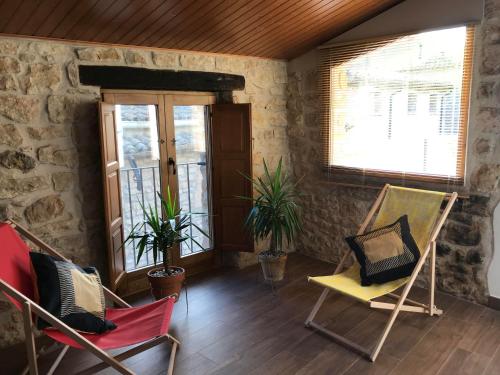 Shared lounge/TV area, Cal Triquell in El Vilosell