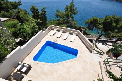 Seaside apartments with a swimming pool Puntinak Brac - 769
