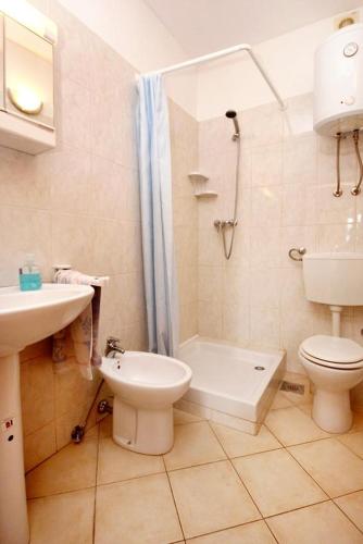 Apartments by the sea Marina, Trogir - 10003