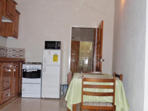 ห้องครัว, Memories Cottage and Apartments in บุคกู