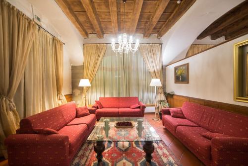 Спільний лаунж/ТБ зона, HG Abetone e Piramidi Resort in Абетоне