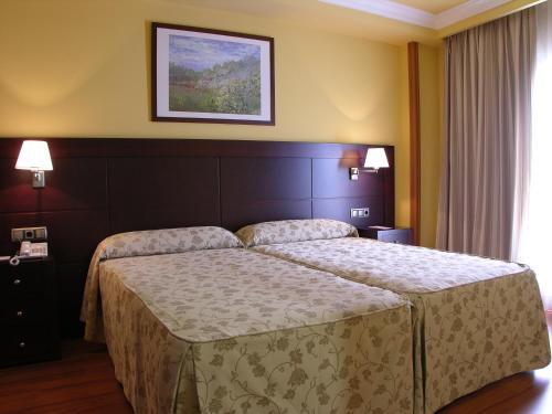 Double Room with Extra Bed (2 Adults + 1 Child)