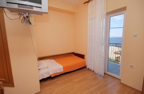 Studio with Balcony and Sea View room in Studio Senj 5560a