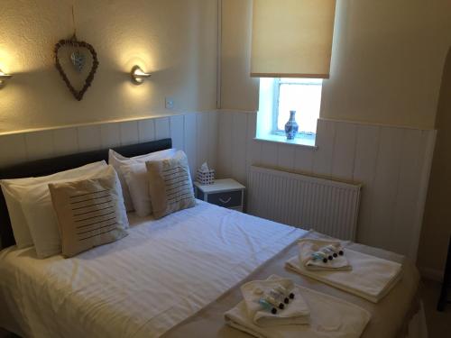The Feathers Room Type - Two-Bedroom Apartment (2 Adults + 2 Children)