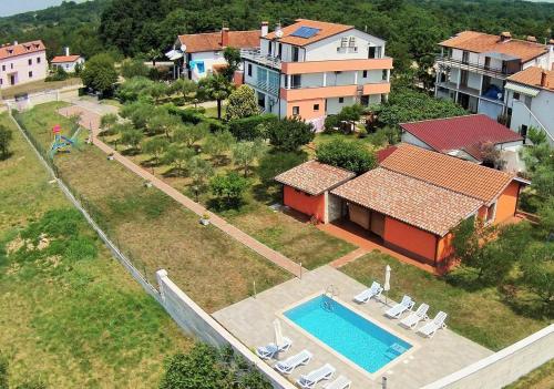 Family friendly apartments with a swimming pool Babici Umag - 2531
