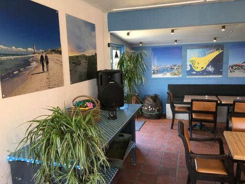 ห้องส่วนกลางสำหรับนั่งเล่น/ดูทีวี, Casablanca Hostel, hyggelig overnatning in เกรนา