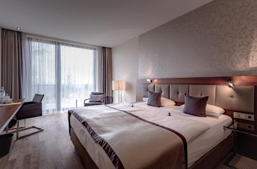 Schlosshotel Kassel The 4-star Schlosshotel Kassel offers comfort and convenience whether youre on business or holiday in Kassel. The hotel offers a high standard of service and amenities to suit the individual needs of