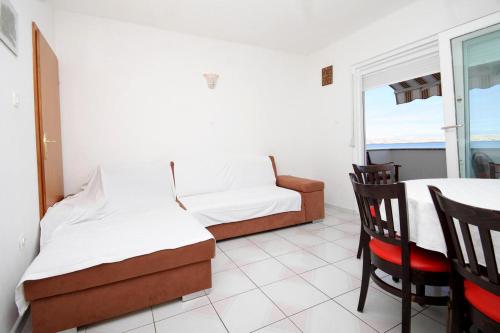 Apartments by the sea Kustici Pag - 9360 - image 2