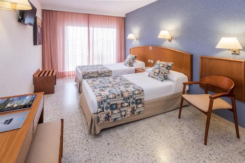 Twin Room with Extra Bed and Balcony (2 Adults + 1 Child)