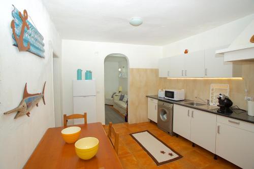 ห้องครัว, Casinha da Aldeia in เมลิเดส