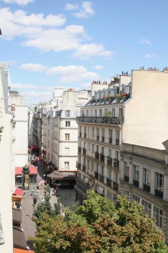 Appartement lumineux avec balcon au coeur de Paris - image 7