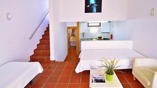 포르토 코보 Parque de Campismo da Ilha do Pessegueiro 3성급 게스트하우스 스위트룸