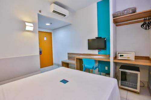 Mega Moda Hotel Ideally located in the prime touristic area of Goiania, Soft Inn Mega Moda promises a relaxing and wonderful visit. The hotel offers a wide range of amenities and perks to ensure you have a great time