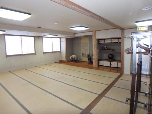 Superior Japanese-Style Family Room with Shared Bathroom