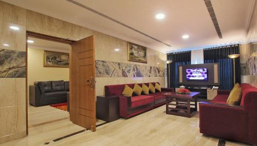 Koplietošanas atpūtas telpa ar TV, Seashore Residency in Kodungallur