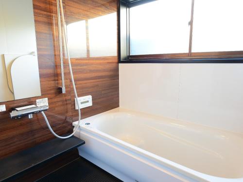 Pezsgőfürdő, Vacation House Familia in Kozushima