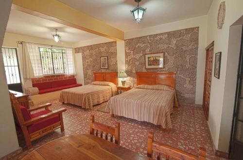 Hotel Posada San Javier Set in a prime location of Taxco, Hotel Posada San Javier puts everything the city has to offer just outside your doorstep. Offering a variety of facilities and services, the hotel provides all you ne