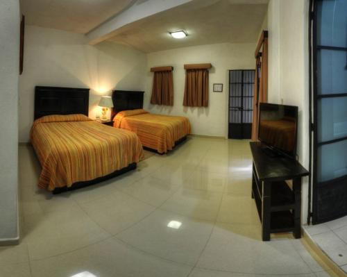 Hotel Posada San Javier Set in a prime location of Taxco, Hotel Posada San Javier puts everything the city has to offer just outside your doorstep. Offering a variety of facilities and services, the hotel provides all you ne