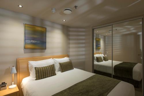 Quest on Durham The 4-star Quest Tauranga Serviced Apartments offers comfort and convenience whether youre on business or holiday in Tauranga. The hotel offers a high standard of service and amenities to suit the in