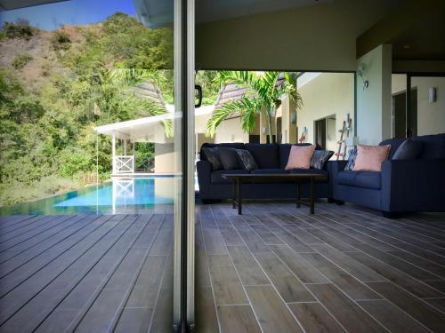 Balcony/terrace, Amazing ocean view Villa vista Chocoyas in Potrero