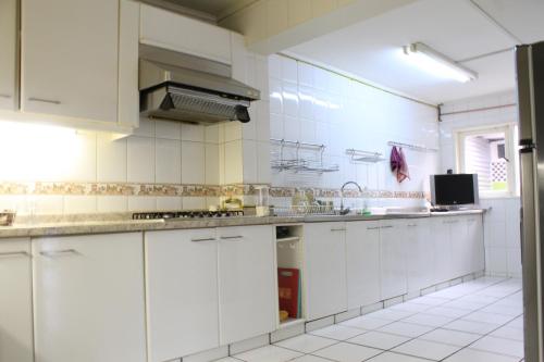 廚房, Kapai Hostel in 瓦爾迪維亞市中心