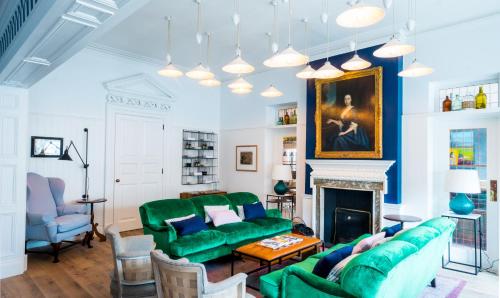 Shared lounge/TV area, The Swan Hotel in Lowestoft