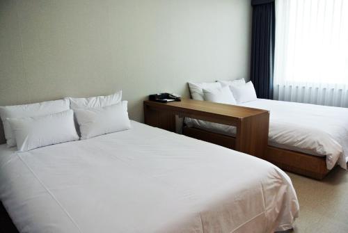 Zimmer mit 2 einzelbetten, familien