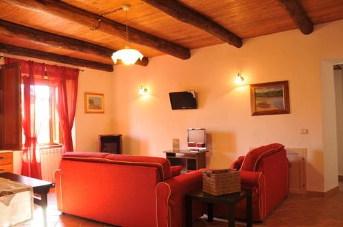 Спільний лаунж/ТБ зона, B&B Il Melograno in Торторелла