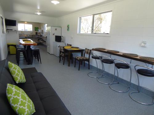 Shared lounge/TV area, Glenavys Waitaki River Motor Camp in Oamaru