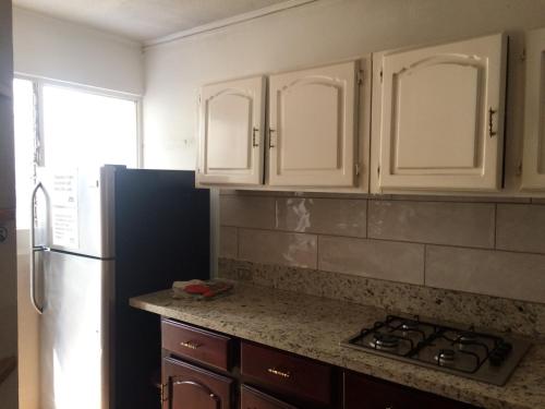 Kitchen, Gaudy's Hostel in Merced