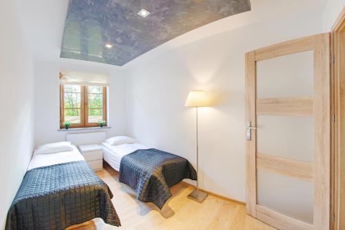 Apartamenty Sun & Snow Leśny Dom - image 3