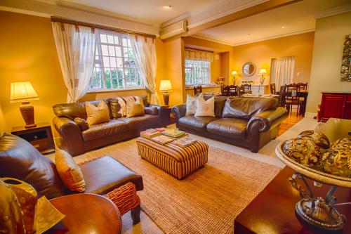 Közös társalgó / TV, Musgrave Avenue Guest Lodge in Berea
