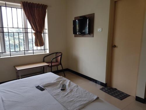 SK Residency SK Residency is conveniently located in the popular Ram Nagar area. The property features a wide range of facilities to make your stay a pleasant experience. Service-minded staff will welcome and guid