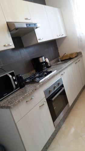 Kitchen, Appartement Agadir in Bensergao