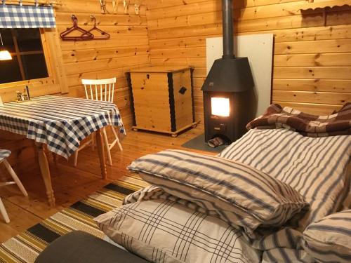 Stuga vid Hedenasets stencafe in Hedenaset