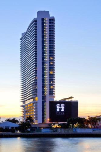 a large building with a clock on top of it, Hyde Resort and Residences in Fort Lauderdale (FL)