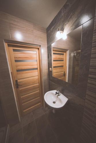 Pokoje i Apartamenty Nad Potokiem, Закопане (фото 8)