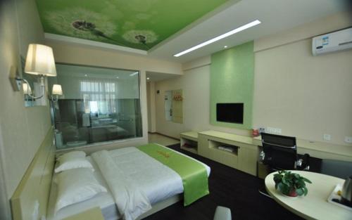. JUNYI Hotel Yunnan Mang City Meili Spring