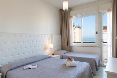 Hotel La Perla Rimini Room Type - Quadruple Room with Sea View