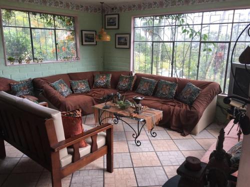 Közös társalgó / TV, NUESTRA CASA -OUR HOME Yunguilla Valley by A2CC in Compañía